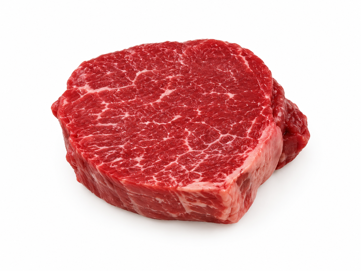 Uncooked Filet Mignon steak on a white background