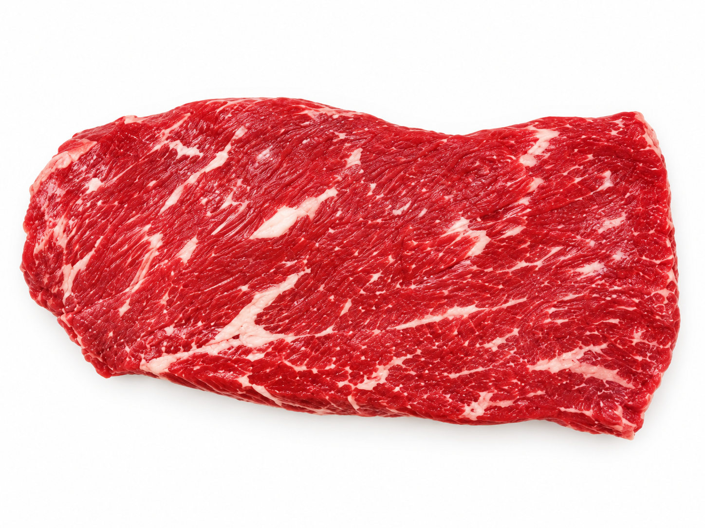 Uncooked Flat Iron steak on a white background