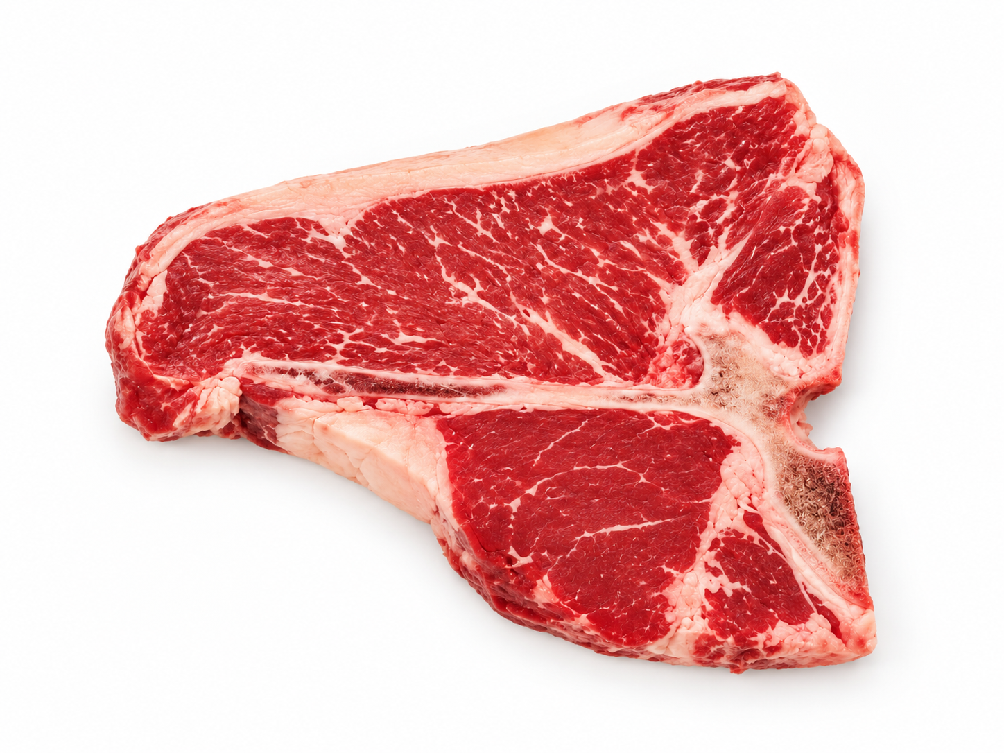 Uncooked Porterhouse steak on a white background